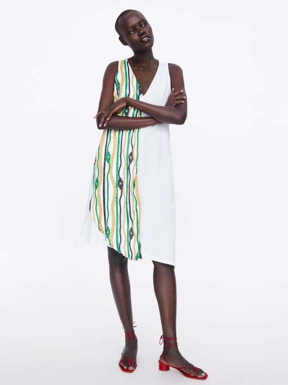 Zara women’s white dress size small with green yellow black chain accents
